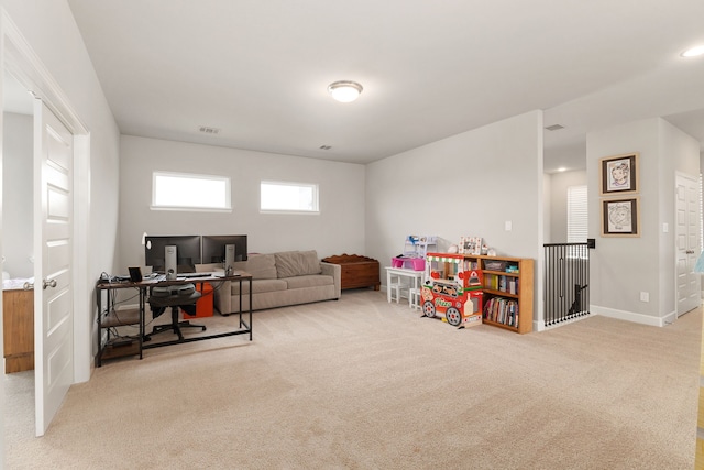 1918 Longcroft Ln, Katy, TX 77493 - living room with carpet floors, a desk, and baseboards