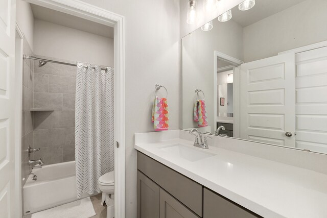 1918 Longcroft Ln, Katy, TX 77493 - full bathroom featuring toilet, vanity, shower / tub combo with curtain, and tile patterned floors