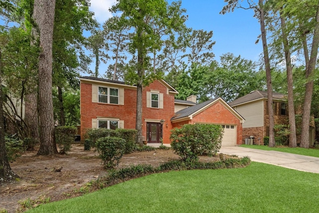 28 Silver Elm Pl, The Woodlands, TX 77381 - view of front of house featuring brick siding, concrete driveway, a garage, and a front yard