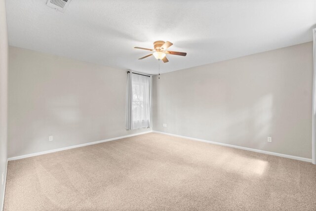 28 Silver Elm Pl, The Woodlands, TX 77381 - unfurnished room with a ceiling fan, carpet, and baseboards