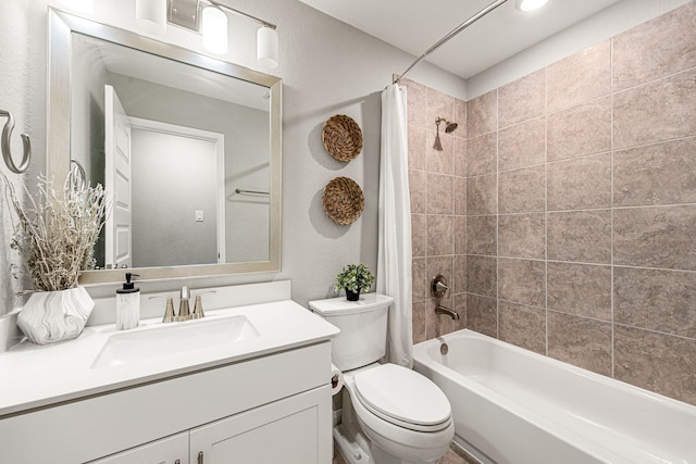 14121 N Lake Branch Ln, Houston, TX 77044 - bathroom featuring shower / tub combo with curtain, vanity, toilet, and a textured wall