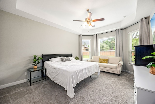 14121 N Lake Branch Ln, Houston, TX 77044 - carpeted bedroom featuring baseboards and ceiling fan