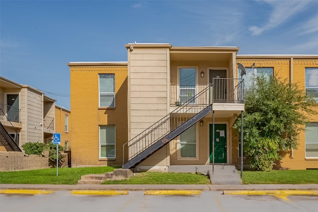 8100 Creekbend Dr Unit 146, Houston, TX 77071 - view of building exterior featuring uncovered parking and stairway