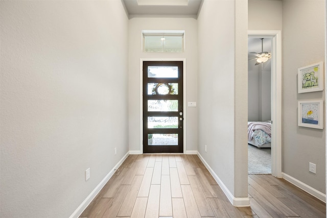 10522 Rigel Ridge Way, Richmond, TX 77406 - entryway featuring light wood-type flooring, plenty of natural light, and baseboards