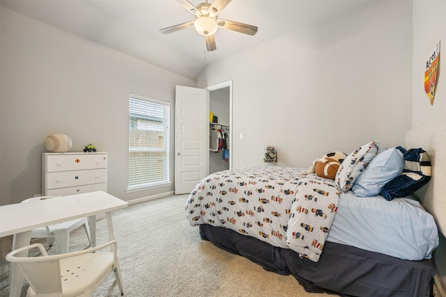 10522 Rigel Ridge Way, Richmond, TX 77406 - bedroom with carpet, a ceiling fan, and a spacious closet