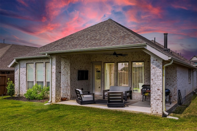 10522 Rigel Ridge Way, Richmond, TX 77406 - back of house featuring a ceiling fan, a patio, an outdoor hangout area, and roof with shingles