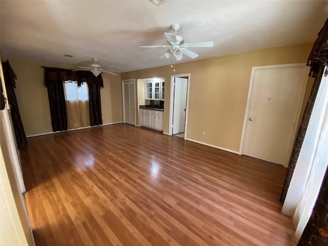 3306 High Pine Dr, Missouri City, TX 77459 - spare room with light wood-style flooring, a ceiling fan, and baseboards