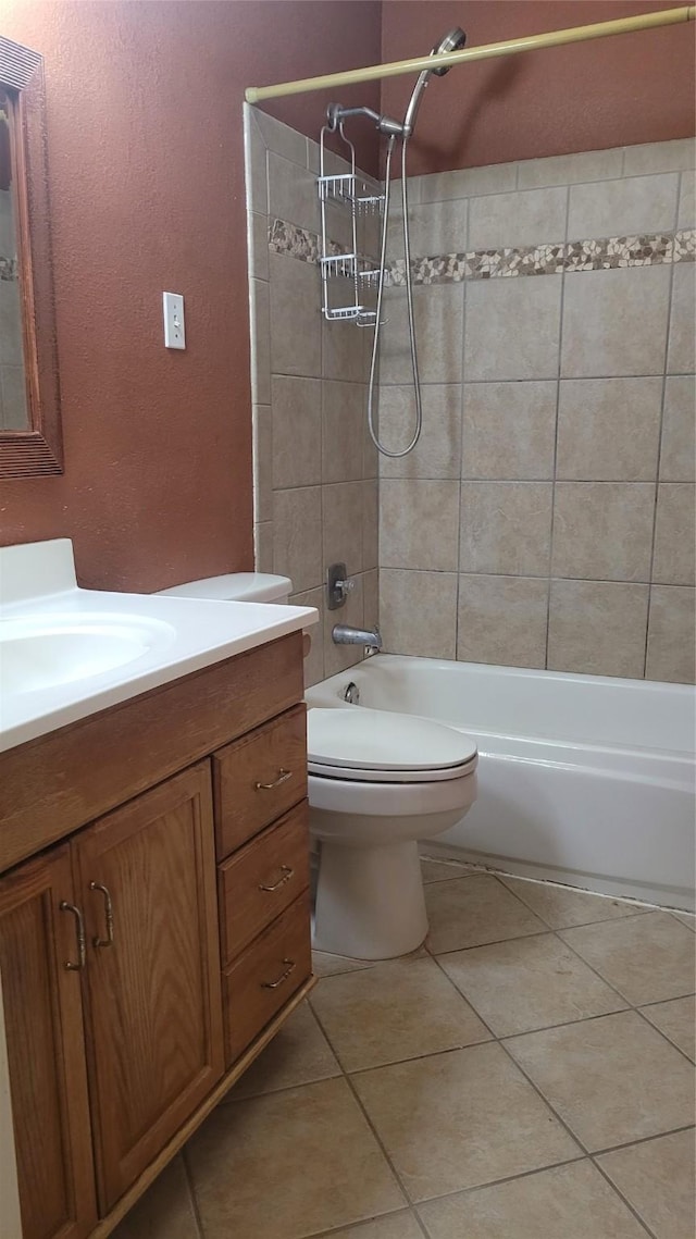 3306 High Pine Dr, Missouri City, TX 77459 - bathroom featuring vanity,  shower combination, tile patterned flooring, toilet, and a textured wall