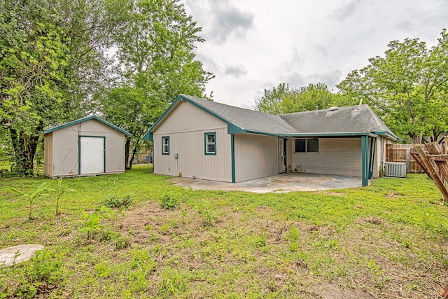 1006 Fruitvale Dr, Houston, TX 77038 - back of property with a patio, central AC, and brick siding