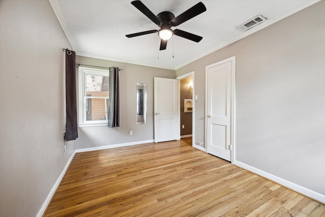 7658 El Rancho St, Houston, TX 77087 - unfurnished bedroom featuring light wood-style floors, crown molding, baseboards, and ceiling fan