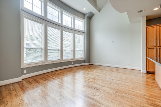 2915 Pease St, Houston, TX 77003 - empty room featuring baseboards, light wood finished floors, and recessed lighting
