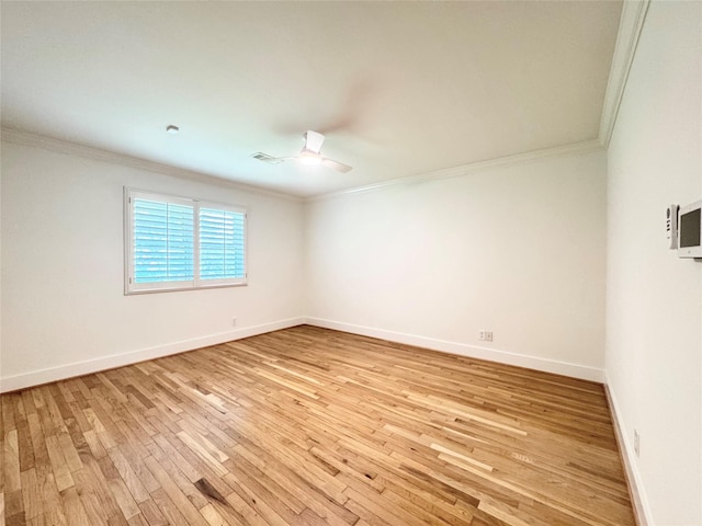5010 Redstart St, Houston, TX 77035 - unfurnished room featuring ornamental molding, light wood finished floors, ceiling fan, and baseboards