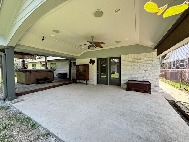 5010 Redstart St, Houston, TX 77035 - view of patio with a hot tub, ceiling fan, and central AC