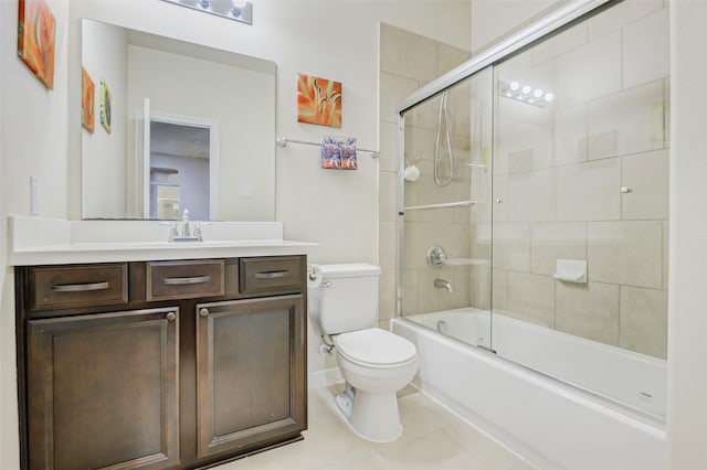 4114 Elk Bluff Ln, Katy, TX 77494 - bathroom with toilet, vanity, combined bath / shower with glass door, tile patterned flooring, and baseboards