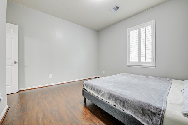 4114 Elk Bluff Ln, Katy, TX 77494 - bedroom with wood finished floors and baseboards