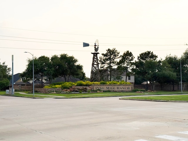 4114 Elk Bluff Ln, Katy, TX 77494 - view of concrete road featuring sidewalks, curbs, and street lighting