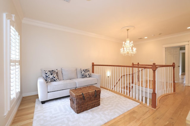 1132 Oxford St, Houston, TX 77008 - living room with a chandelier, plenty of natural light, light wood-style floors, ornamental molding, and baseboards