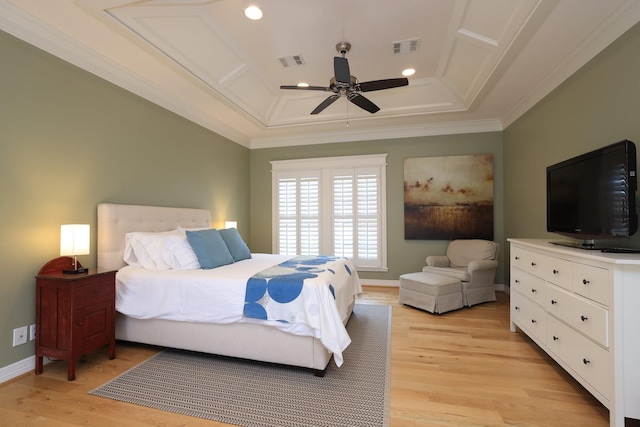 1132 Oxford St, Houston, TX 77008 - bedroom featuring light wood-style flooring, recessed lighting, crown molding, a raised ceiling, and ceiling fan