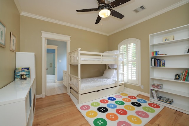1132 Oxford St, Houston, TX 77008 - bedroom featuring light wood-style flooring, crown molding, baseboards, and ceiling fan