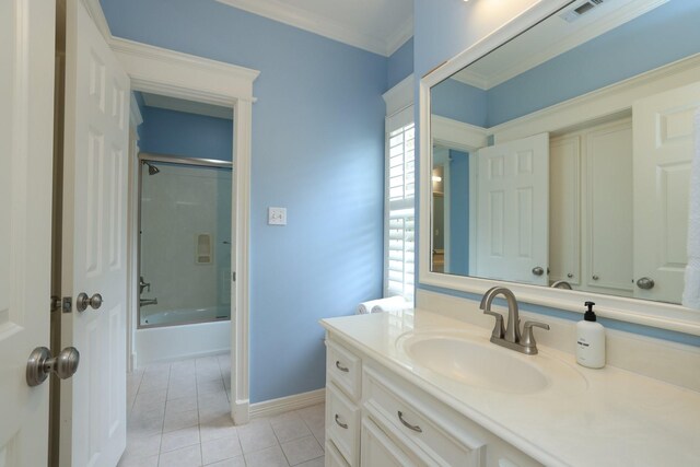 1132 Oxford St, Houston, TX 77008 - full bath with vanity, tile patterned floors, enclosed tub / shower combo, crown molding, and baseboards