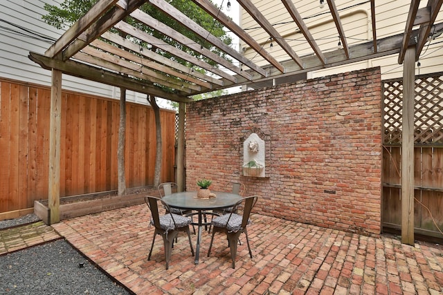 1132 Oxford St, Houston, TX 77008 - view of patio / terrace featuring a pergola and outdoor dining space