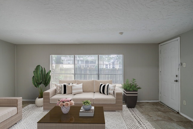 5902 Yorkgate Dr, Spring, TX 77373 - living area featuring baseboards and a textured ceiling