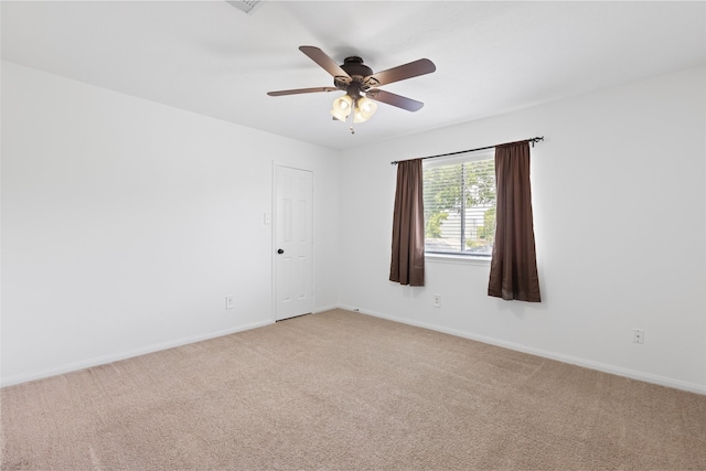 3901 Kimberly Dr, Pearland, TX 77581 - spare room with light colored carpet, a ceiling fan, and baseboards