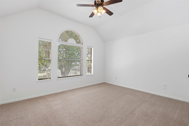 3901 Kimberly Dr, Pearland, TX 77581 - carpeted empty room featuring vaulted ceiling, a ceiling fan, and baseboards