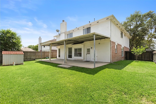 3901 Kimberly Dr, Pearland, TX 77581 - back of house with a patio, brick siding, and a chimney