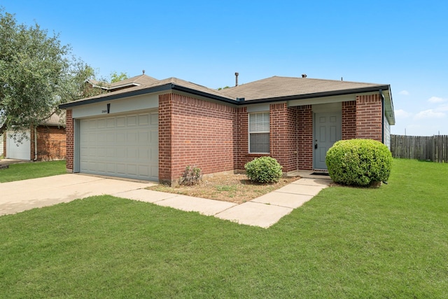 21606 Borah Peak Way, Katy, TX 77449 - view of front of home with a garage, driveway, and brick siding