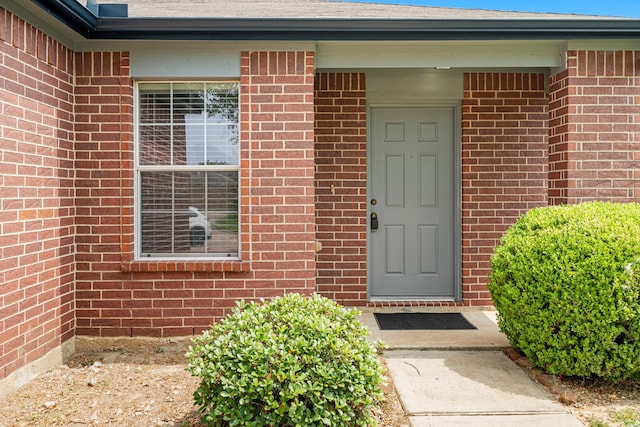 21606 Borah Peak Way, Katy, TX 77449 - doorway to property featuring brick siding