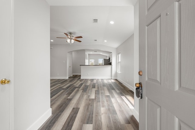 21606 Borah Peak Way, Katy, TX 77449 - foyer featuring wood finished floors, recessed lighting, a ceiling fan, baseboards, and arched walkways