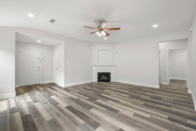 21606 Borah Peak Way, Katy, TX 77449 - unfurnished living room featuring ceiling fan, wood finished floors, baseboards, recessed lighting, and a fireplace