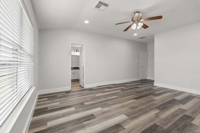 21606 Borah Peak Way, Katy, TX 77449 - empty room with ceiling fan, recessed lighting, wood finished floors, baseboards, and vaulted ceiling