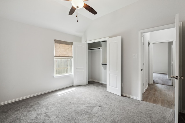 19218 Charisma Rose Ln, Tomball, TX 77377 - unfurnished bedroom featuring carpet, lofted ceiling, a closet, baseboards, and a ceiling fan