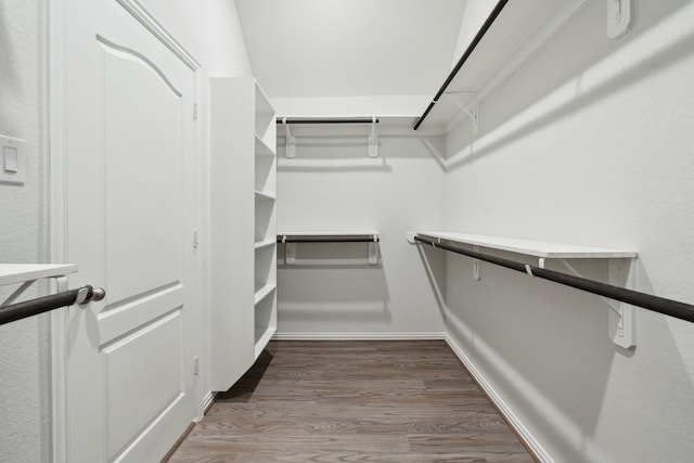 19218 Charisma Rose Ln, Tomball, TX 77377 - walk in closet featuring wood finished floors