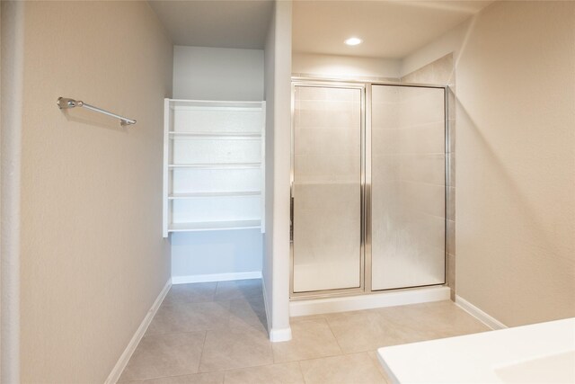 3518 Windham Way, Katy, TX 77494 - full bathroom with a stall shower, tile patterned flooring, and baseboards