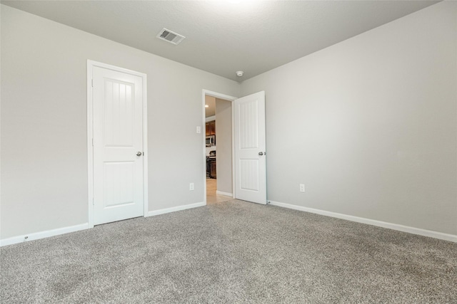 3518 Windham Way, Katy, TX 77494 - unfurnished bedroom featuring light carpet and baseboards