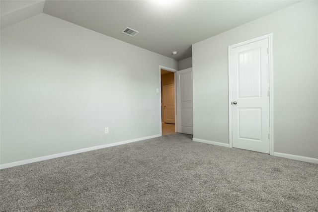 3518 Windham Way, Katy, TX 77494 - unfurnished bedroom featuring carpet floors, baseboards, and vaulted ceiling