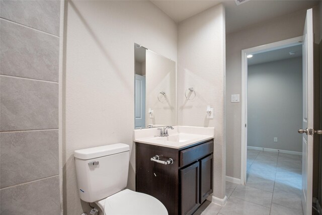 3518 Windham Way, Katy, TX 77494 - half bath featuring toilet, vanity, tile patterned flooring, and baseboards