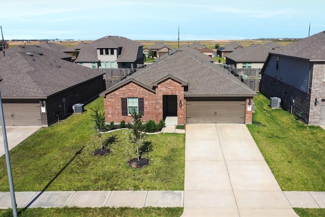3518 Windham Way, Katy, TX 77494 - view of front of property featuring brick siding, a residential view, an attached garage, and a shingled roof