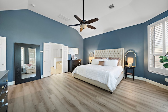 8442 Horsepen Bend Dr, Conroe, TX 77385 - bedroom with wood finished floors, high vaulted ceiling, baseboards, and ceiling fan