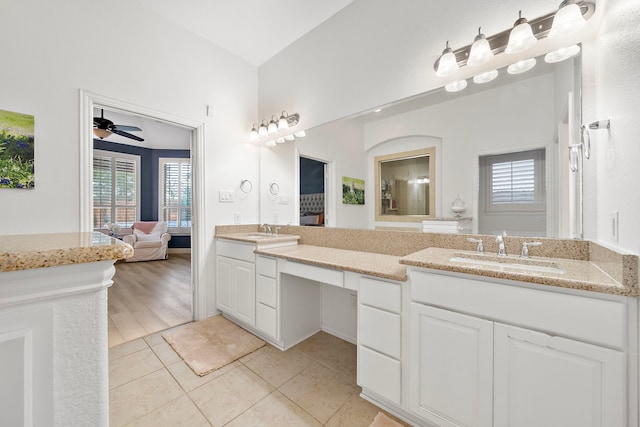 8442 Horsepen Bend Dr, Conroe, TX 77385 - full bathroom with connected bathroom, double vanity, tile patterned floors, and healthy amount of natural light