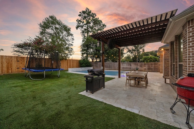 8442 Horsepen Bend Dr, Conroe, TX 77385 - view of yard with a pergola, a patio area, and a trampoline