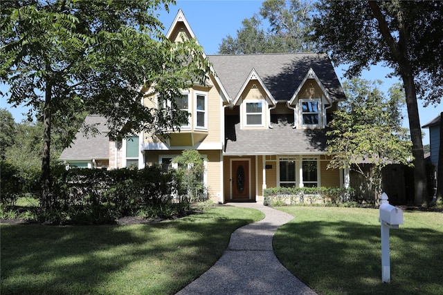 3003 Roseheath Ln, Houston, TX 77073 - view of front of house featuring a front yard and roof with shingles