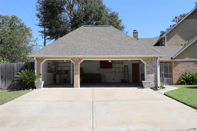 3003 Roseheath Ln, Houston, TX 77073 - view of front of home featuring an attached garage, a shingled roof, a chimney, concrete driveway, and brick siding