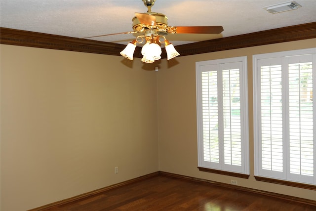 3003 Roseheath Ln, Houston, TX 77073 - empty room with ornamental molding, dark wood finished floors, baseboards, and a ceiling fan