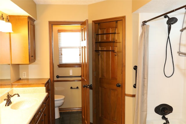 3003 Roseheath Ln, Houston, TX 77073 - full bathroom with vanity, toilet, shower / bath combo with shower curtain, and tile patterned floors