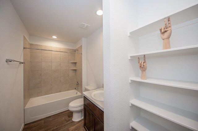 5126 Ternberry Forest Ln, Katy, TX 77449 - full bath featuring wood finished floors, toilet, vanity, bathing tub / shower combination, and recessed lighting
