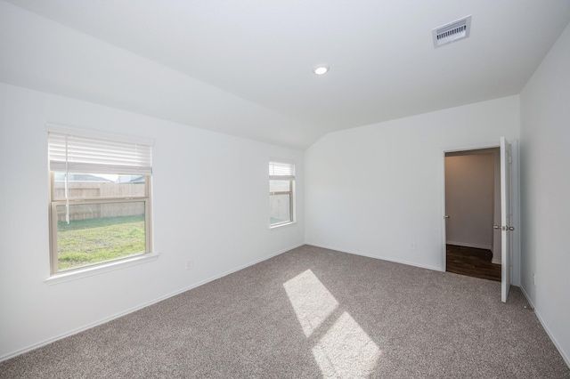 5126 Ternberry Forest Ln, Katy, TX 77449 - spare room featuring carpet flooring, vaulted ceiling, and baseboards